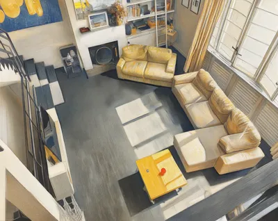 High-angle view of a modern living room with yellow sofas, dark flooring, large windows, and a staircase.